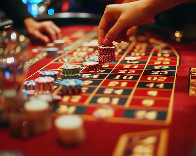 Spadegaming slot interface with reels, payline indicators, and deposit-funding options